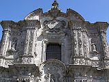 Ecuador Quito 04-01 Old Quito La Compania de Jesus Outside La Compania de Jesus is often called the most beautiful church in Ecuador. The outside is of carved volcanic stone and is crammed with twisted columns, full-size statues, busts, sculpted hearts, and leaves.